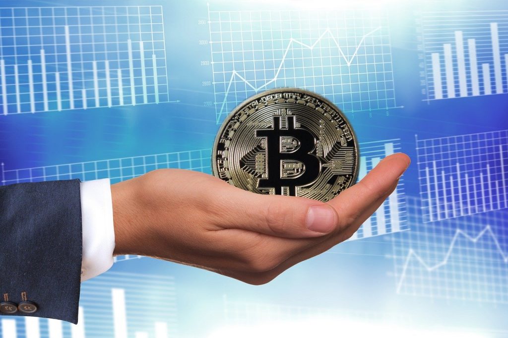Bitcoin dans la main : que vaut le Bitcoin ?