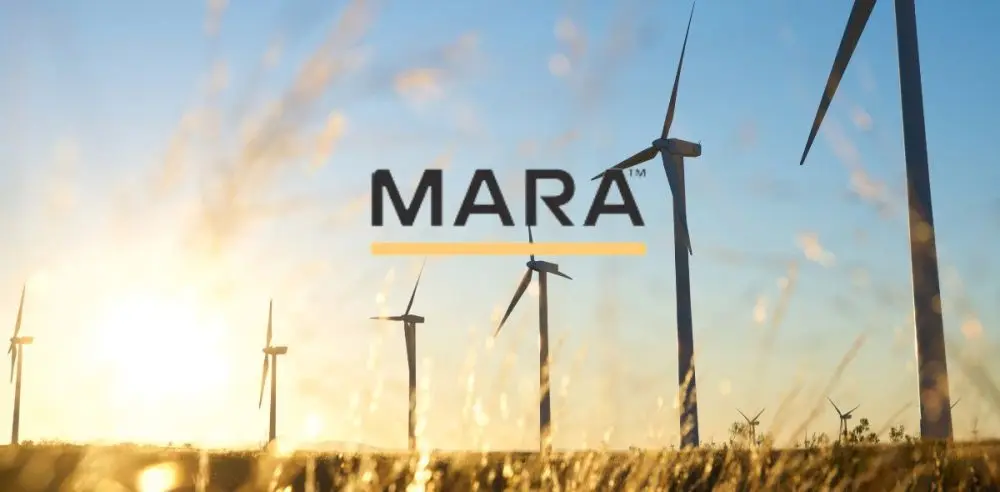 Wind turbines in a field during sunset with 'MARA' logo overlay.