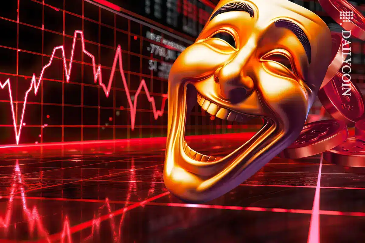 Golden laughing mask in front of a red stock market graph depicting a decline.