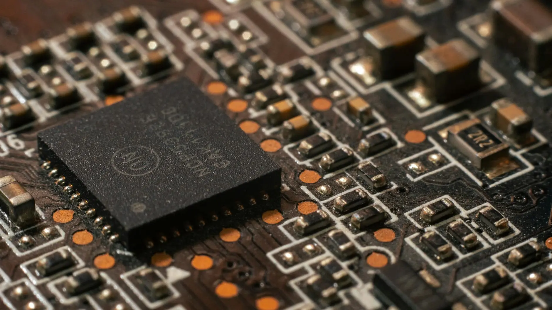 Close-up of a circuit board featuring various electronic components.